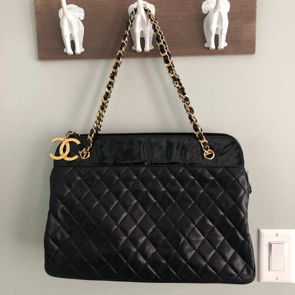 Black vintage authentic chanel shoulder bag w golden chain detailing